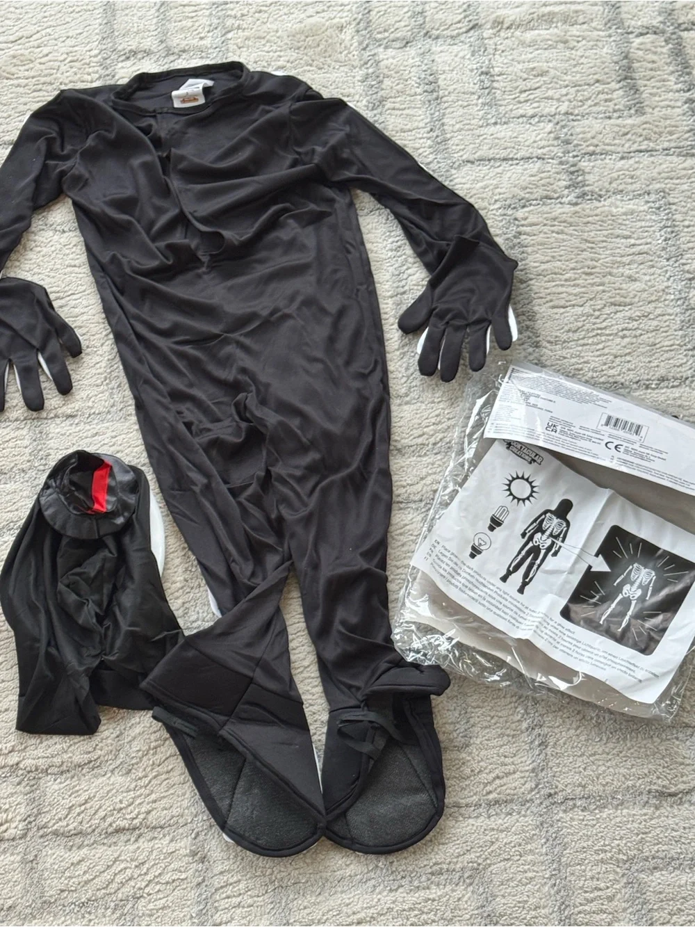 Spooktacular glows in dark Skullbones Halloween costume small